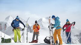 Backcountry skiers getting gear ready